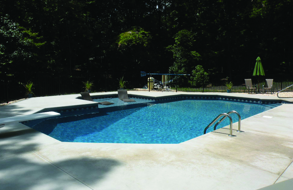 Grecian featuring an 8’ offset Nexus Polymer Stair and Sundeck